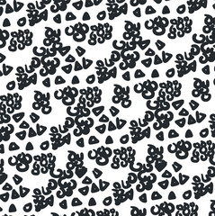 Small spots and rounded dense shapes form an abstract background.