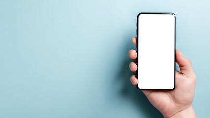 青い背景で白い画面のスマートフォンを持つ手