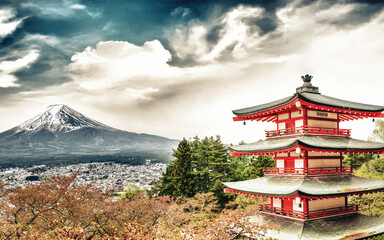 Scenic spring panorama with blooming cherry blossoms, Chureito Pagoda, and Mount Fuji in view