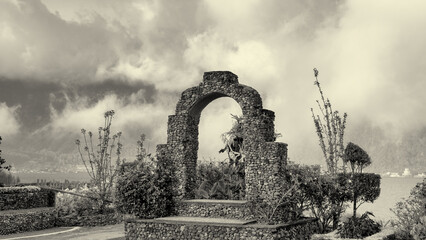 Scenic view of Pura Ulun Danu Beratan Bedugul temple surrounded by lake and misty highlands in Bali