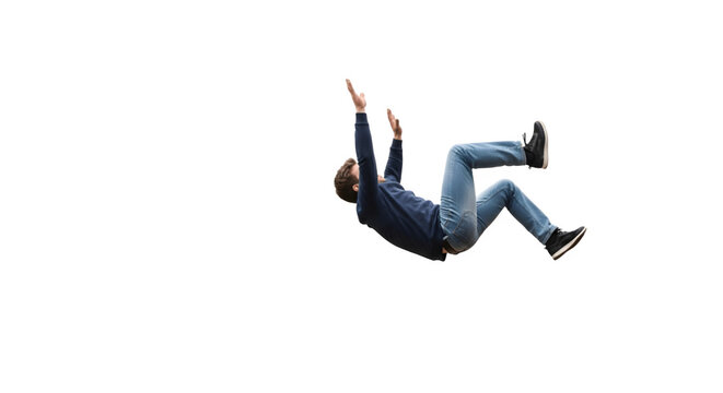 Man in midair falling or jumping with arms raised.