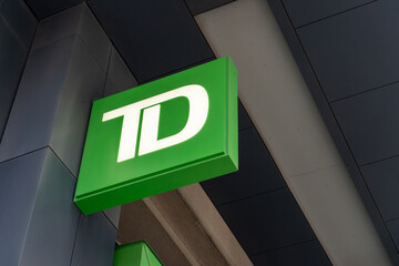 Fototapeta premium Toronto, ON, Canada - November 8, 2025: Close up of TD (Toronto Dominion Bank) logo on the building is seen in Toronto, ON, Canada. 