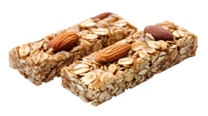 Two granola bars with almonds on top stacked on each other on a black background close up shot