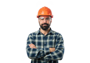 A bearded construction worker wearing an orange hard hat and safety glasses with arms crossed isolated on transparent background