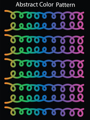 Vibrant rainbow spiral pattern on black background