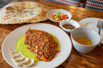 arabic dishes and plates on the table in yemeni restaurant in jeju island
