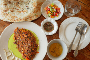 arabic dishes and plates on the table in yemeni restaurant in jeju island