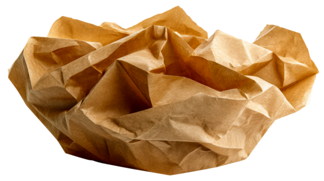 Crushed brown paper object with textured folds