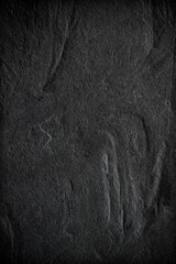 Dark grey black slate background or texture.