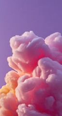 Pink and yellow pastel clouds against a vibrant purple-pink sky