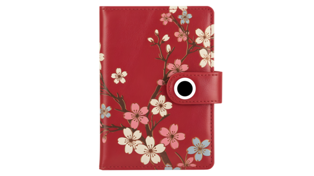 Elegant red organizer with delicate cherry blossom design, perfect for scheduling and personal planning, offering a touch of floral grace and organization