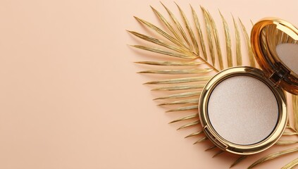Gold compact powder with palm leaf on peach background