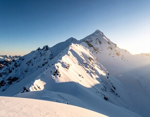 A majestic snow-covered mountain range bathed in the warm glow of the setting sun.