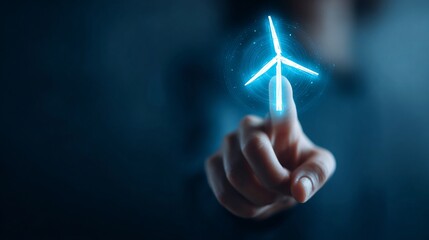 A close-up of a hand interacting with a digital wind turbine symbol, symbolizing clean energy and technology advancements.
