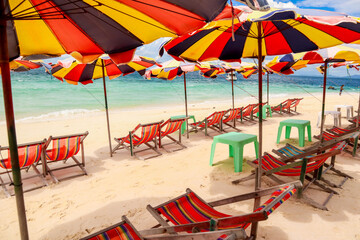 beach chairs and umbrellas