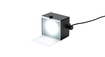 Small black light box with bright white light source isolated on a transparent background