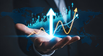 Hand holding glowing financial growth chart with world map