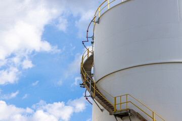 Oil storage tank at oil and gas refinery industrial zone, Business industrial storage tank oil and gas refinery, Crude oil storage tank business energy logistic and transportation.