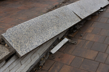 Damaged Marble Curb and Brick Pavement Close-up of Broken City Border