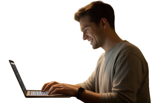 Side View of Smiling Man Typing on Laptop