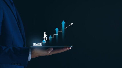 Startup business. Businessman starting an online company. Planning his business, trade, profits, future investment on tablet virtual screen. Startup to success business. digital planning technology.