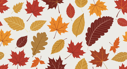 Seamless pattern of vibrant autumn leaves in warm colors, including maple and oak varieties, creating a decorative and festive fall background for seasonal designs and projects.