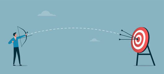 Businessman successfully hitting the target. Symbol of depicts success, hat trick, accuracy, on target, achievement, perfection, and accomplishment.