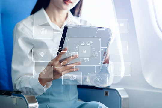 Asian businesswoman using tablet with AI digital interface during flight. Concept of artificial intelligence, innovation, and smart technology.