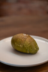 Green tea, Matcha Salted bread served on plate, on the wooden table