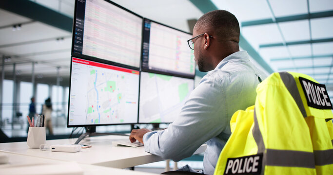 Emergency Call Center Manager: Police Officer Monitoring Security Operations