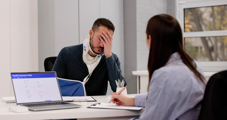 Fototapeta premium Injured Worker Seeks Compensation