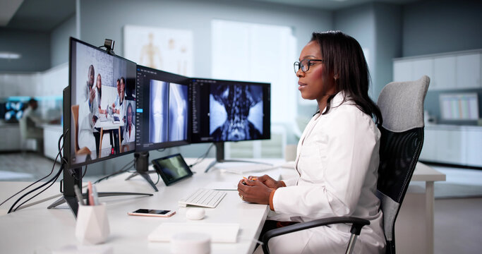 African American Woman Streaming Medical Webinar - Powered by Adobe