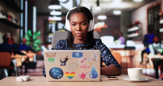 Young African American Graphic Design Student Working On Marketing Materials