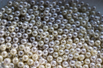 Beautiful white beads. Pearls. Bead texture and background.