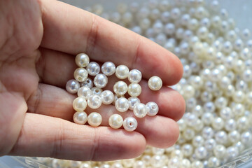 Beautiful white beads. Pearls. Bead texture and background.
