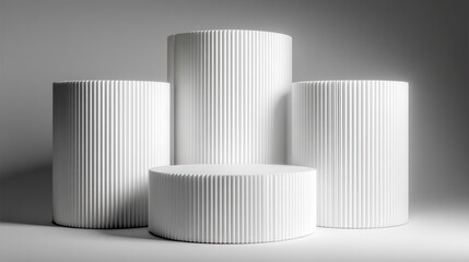 Four white ribbed cylinders of varying heights on a minimalist light grey background