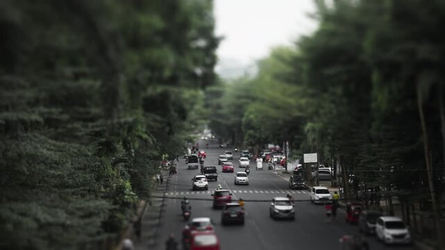 Busy Indonesian City Street in the Afternoon with Traffic