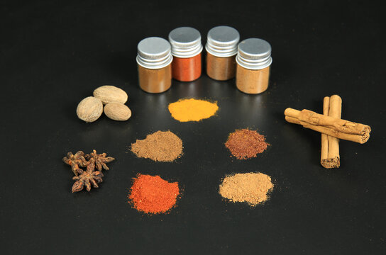 Lots of spices on a black background