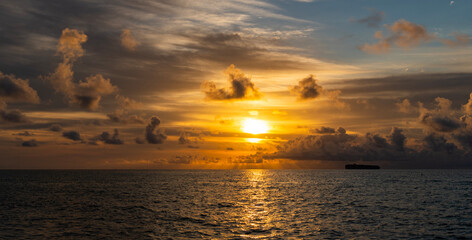 Calm horizon at sea nature. Romantic summer vacation on beach seascape. Sunrise sky horizon. Sea sunset view. Cloudy sunset sky and seascape at summer vacation. Skyscape with sea sunrise. Afterglow