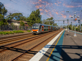 Passenger Train going through Summer Hill train station a suburban Sydney train Station NSW Australia