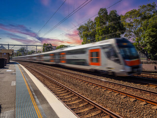 Fototapeta premium Passenger Train going through Summer Hill train station a suburban Sydney train Station NSW Australia