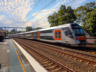 Passenger Train going through Summer Hill train station a suburban Sydney train Station NSW Australia