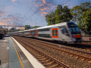 Passenger Train going through Summer Hill train station a suburban Sydney train Station NSW Australia
