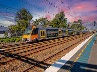 Naklejka premium Passenger Train going through Summer Hill train station a suburban Sydney train Station NSW Australia