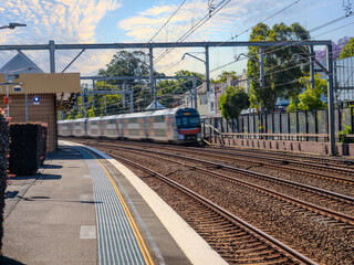 Passenger Train going through Summer Hill train station a suburban Sydney train Station NSW Australia