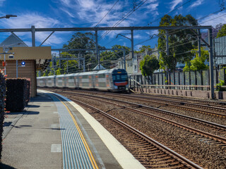 Passenger Train going through Summer Hill train station a suburban Sydney train Station NSW Australia