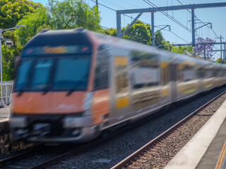 Fototapeta premium Passenger Train going through Summer Hill train station a suburban Sydney train Station NSW Australia