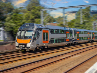 Passenger Train going through Summer Hill train station a suburban Sydney train Station NSW Australia