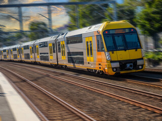 Fototapeta premium Passenger Train going through Summer Hill train station a suburban Sydney train Station NSW Australia
