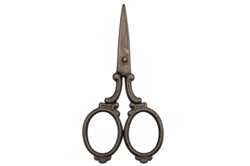 Vintage ornate sewing scissors with decorative handles, antique embroidery shears for crafting and needlework activities